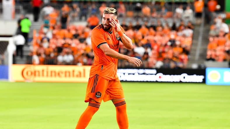 Jul 23, 2022; Houston, Texas, USA; Houston Dynamo FC midfielder Hector Herrera (16) motions to the sideline as he bleeds from a header during the first half against the Minnesota United FC at PNC Stadium. Mandatory Credit: Maria Lysaker-Houston Dynamo FC-USA TODAY Sports