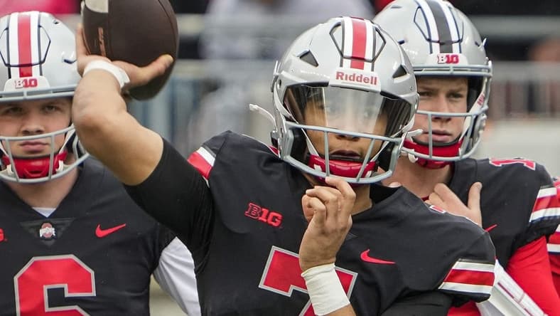Ohio State Buckeyes quarterback C.J. Stroud, center, throws in front of quarterbacks Kyle McCord, left, and Devin Brown during the spring football game at Ohio Stadium in Columbus on April 16, 2022.

Cj Stroud Spring Game