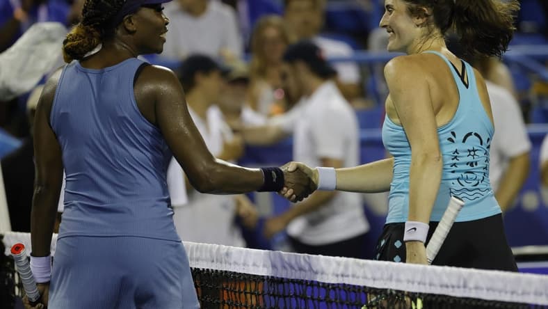 Aug 1, 2022; Washington, DC, USA; Venus Williams (USA) (L) shakes hands with Rebecca Marino (CAN) (R) after their match on day one of the Citi Open at Rock Creek Park Tennis Center. Mandatory Credit: Geoff Burke-USA TODAY Sports