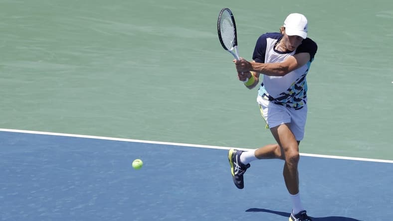 Aug 3, 2022; Washington, DC, USA; Emil Ruusuvuori (FIN) hits a backhand against Hubert Hurkacz (POL) (not pictured) on day three of the Citi Open at Rock Creek Park Tennis Center. Mandatory Credit: Geoff Burke-USA TODAY Sports