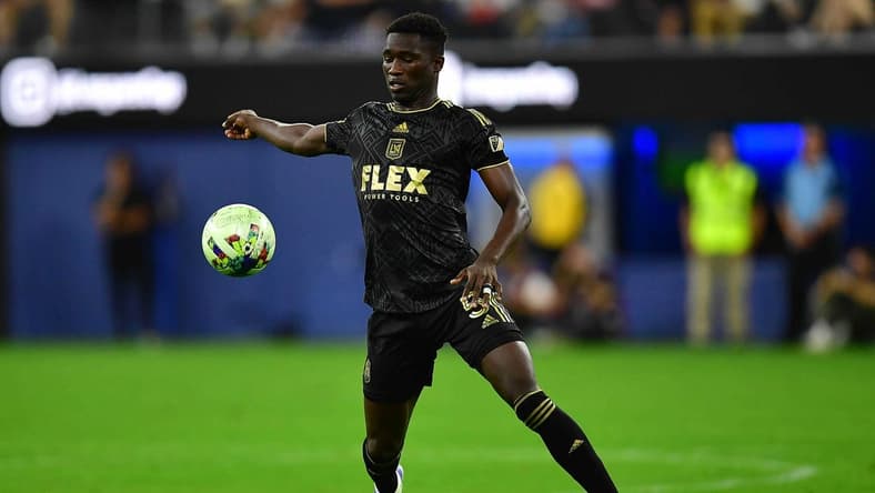 Aug 3, 2022; Los Angeles, California, US; LAFC defender Mamadou Fall (5) moves the ball against Club America during the first half at SoFi Stadium. Mandatory Credit: Gary A. Vasquez-USA TODAY Sports