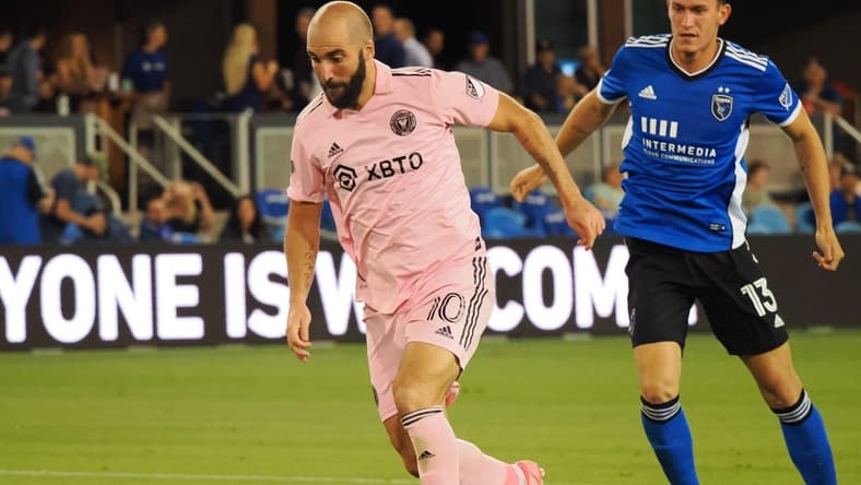 Aug 3, 2022; San Jose, California, USA; Inter Miami FC attacker Gonzalo Higuain (10) brings the ball down the field ahead of San Jose Earthquakes defender Nathan (13) during the second half at PayPal Park. Mandatory Credit: Kelley L Cox-USA TODAY Sports