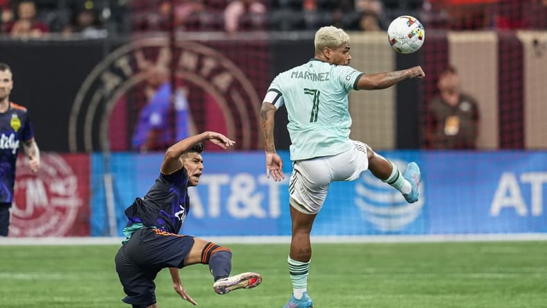 Aug 6, 2022; Atlanta, Georgia, USA; Seattle Sounders defender Xavier Arreaga (3) is able to move the ball past Atlanta United forward Josef Martinez (7) during the second half at Mercedes-Benz Stadium. Mandatory Credit: Dale Zanine-USA TODAY Sports