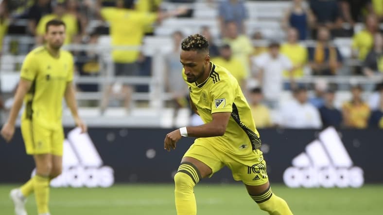 Aug 6, 2022; Nashville, Tennessee, USA;  Nashville SC midfielder Hany Mukhtar (10) dribbles against the Toronto FC during the first half at Geodis Park. Mandatory Credit: Steve Roberts-USA TODAY Sports