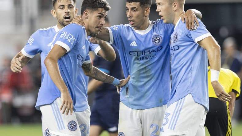 Aug 6, 2022; Columbus, Ohio, USA; New York City midfielder Gabriel Pereira (38) is congratulated by teammates after his second half goal against Columbus Crew at Lower.com Field. Mandatory Credit: Greg Bartram-USA TODAY Sports