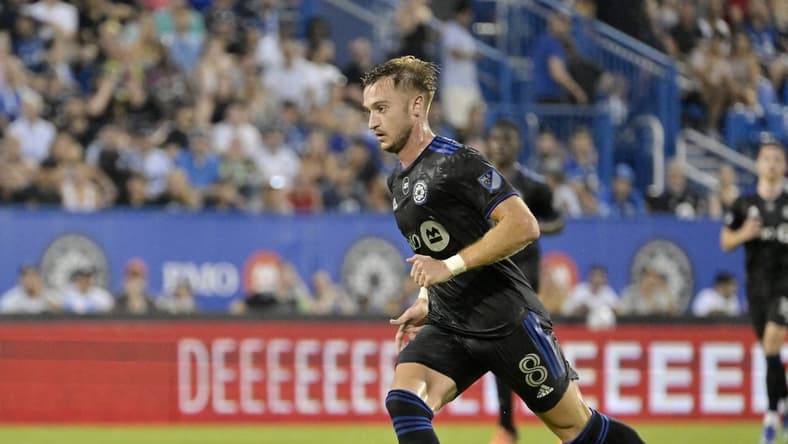 Aug 6, 2022; Montreal, Quebec, CAN; CF Montreal midfielder Djordje Mihailovic (8) plays the ball against Inter Miami CF during the first half at Stade Saputo. Mandatory Credit: Eric Bolte-USA TODAY Sports