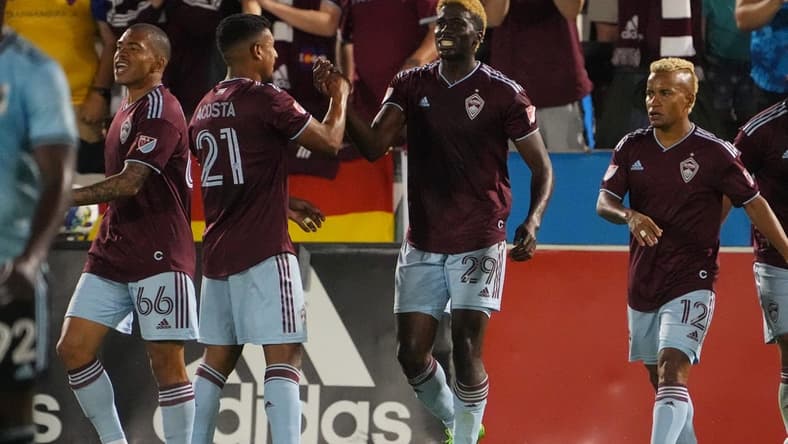 Aug 6, 2022; Commerce City, Colorado, USA; Colorado Rapids forward Gyasi Zardes (29) celebrates his goal with midfielder Bryan Acosta (21) and forward Michael Barrios (12) and defender Lucas Esteves (66) in the second half at Dick's Sporting Goods Park. Mandatory Credit: Ron Chenoy-USA TODAY Sports