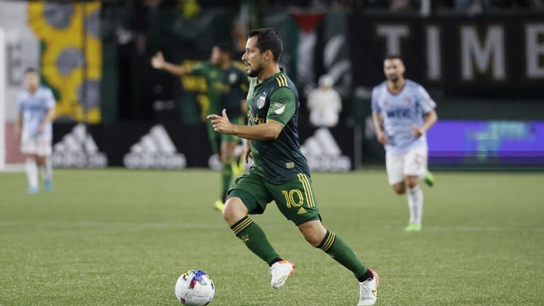 Aug 6, 2022; Portland, Oregon, USA; Portland Timbers midfielder Sebastian Blanco (10) carries the ball during the second half against the FC Dallas at Providence Park. Mandatory Credit: Soobum Im-USA TODAY Sports