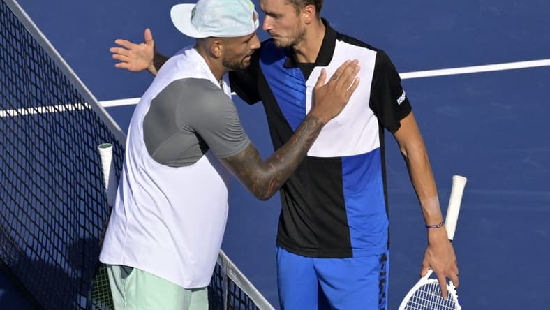 Aug 10, 2022; Montreal, QC, Canada; Nick Kyrgios (AUS) (left) and Daniil Medvedev hug in second round play at IGA Stadium. Mandatory Credit: Eric Bolte-USA TODAY Sports