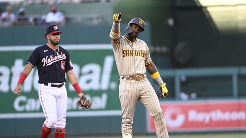 Aug 12, 2022; Washington, District of Columbia, USA; San Diego Padres left fielder Jurickson Profar (10) reacts after hitting a double against the Washington Nationals during the first inning at Nationals Park. Mandatory Credit: Brad Mills-USA TODAY Sports