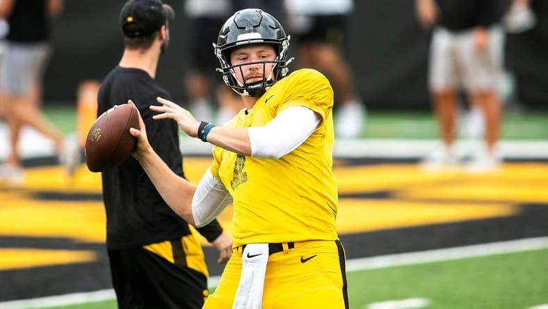 Iowa quarterback Spencer Petras (7) runs a drill during the Kids Day at Kinnick NCAA football practice, Saturday, Aug. 13, 2022, at Kinnick Stadium in Iowa City, Iowa.

220813 Ia Kids Day Fb 023 Jpg