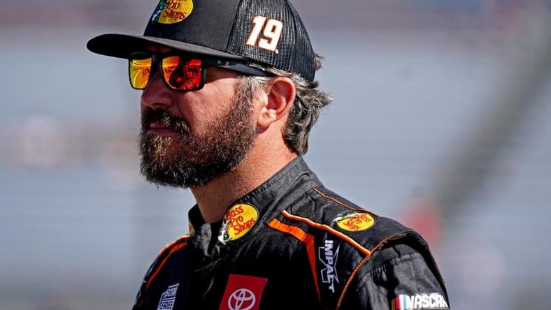 Aug 13, 2022; Richmond, Virginia, USA; NASCAR Cup Series driver Martin Truex Jr. (19) during practice and qualifying for the Federated Auto Parts 400 at Richmond International Raceway. Mandatory Credit: Peter Casey-USA TODAY Sports