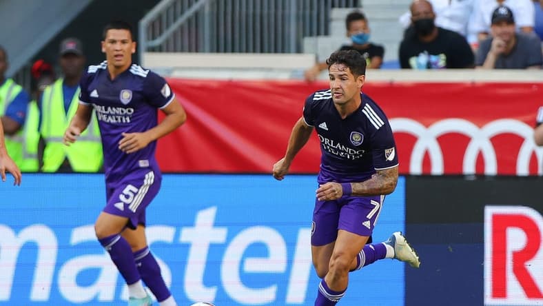 Aug 13, 2022; Harrison, New Jersey, USA; Orlando City SC forward Alexandre Pato (7) controls the ball against the New York Red Bulls during the first half at Red Bull Arena. Mandatory Credit: Vincent Carchietta-USA TODAY Sports