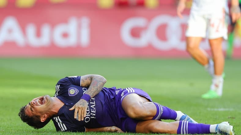 Aug 13, 2022; Harrison, New Jersey, USA; Orlando City SC forward Alexandre Pato (7) reacts after suffering an apparent injury against the New York Red Bulls during the first half at Red Bull Arena. Mandatory Credit: Vincent Carchietta-USA TODAY Sports
