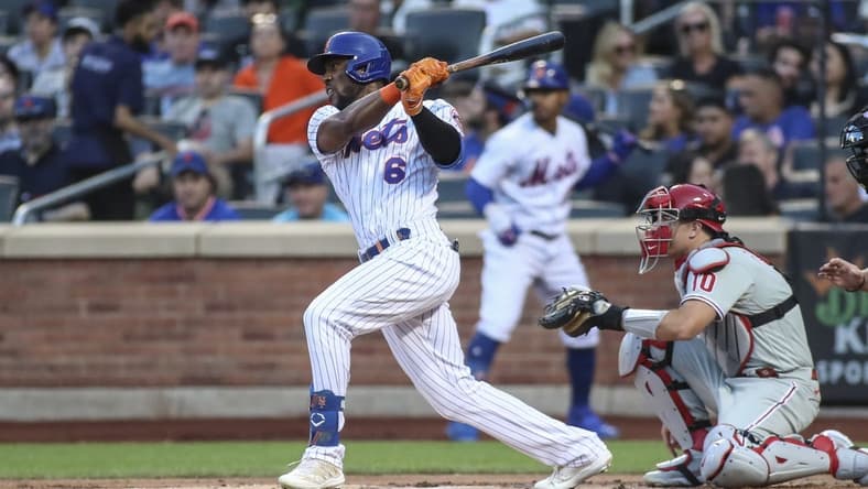 Aug 13, 2022; New York City, New York, USA; New York Mets right fielder Starling Marte (6) hits a single in the first inning against the Philadelphia Phillies at Citi Field. Mandatory Credit: Wendell Cruz-USA TODAY Sports
