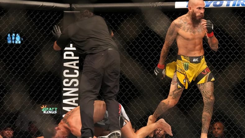 Aug 13, 2022; San Diego, California, USA; Marlon Vera (red gloves) reacts after defeating Dominick Cruz (blue gloves) during UFC Fight Night at Pechanga Arena. Mandatory Credit: Joe Camporeale-USA TODAY Sports
