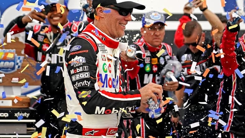 Aug 14, 2022; Richmond, Virginia, USA; NASCAR Cup Series driver Kevin Harvick (4) celebrates winning the Federated Auto Part 400 at Richmond International Raceway. Mandatory Credit: Peter Casey-USA TODAY Sports