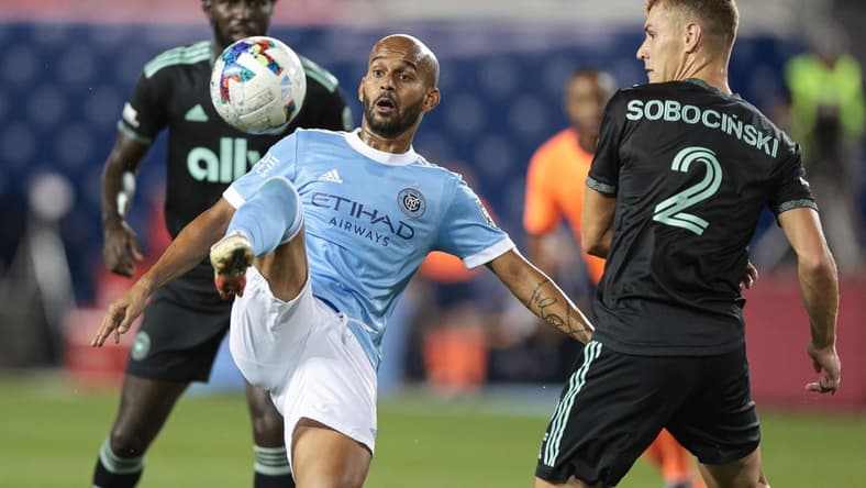 Aug 17, 2022; Harrison, New Jersey, USA; New York City FC forward Heber (9) plays the ball against Charlotte FC defender Jan Sobocinski (2) during the first half at Red Bull Arena. Mandatory Credit: Vincent Carchietta-USA TODAY Sports