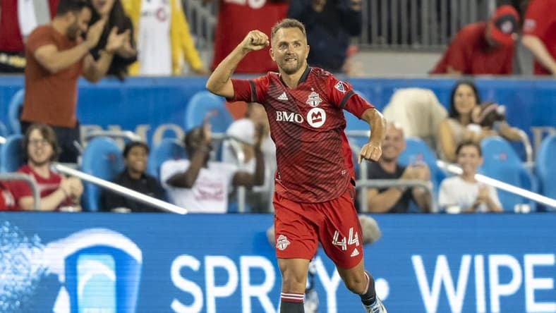Aug 17, 2022; Toronto, Ontario, CAN; Toronto FC defender Domenico Criscito (44) celebrates after scoring a goal against the New England Revolution during the second half at BMO Field. Mandatory Credit: Kevin Sousa-USA TODAY Sports