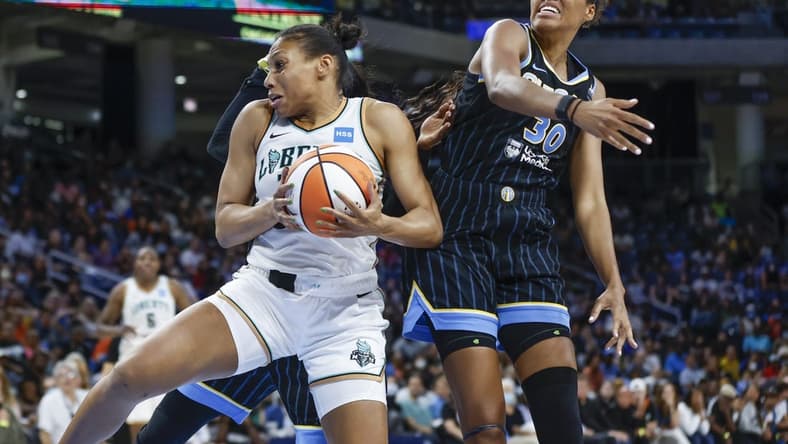 Aug 17, 2022; Chicago, Illinois, USA; New York Liberty forward Betnijah Laney (44) goes to the basket against Chicago Sky forward Azura Stevens (30) during the second half of game one of the first round of the WNBA playoffs at Wintrust Arena. Mandatory Credit: Kamil Krzaczynski-USA TODAY Sports