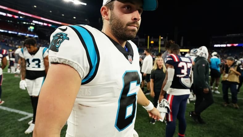 Aug 19, 2022; Foxborough, Massachusetts, USA; Carolina Panthers quarterback Baker Mayfield (6) exits the field after the game against the New England Patriots at Gillette Stadium. Mandatory Credit: David Butler II-USA TODAY Sports