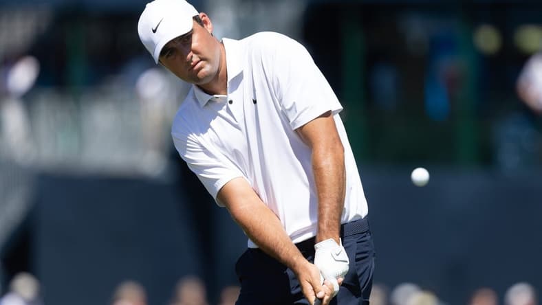 Aug 20, 2022; Wilmington, Delaware, USA; Scottie Scheffler chips onto the second green during the third round of the BMW Championship golf tournament. Mandatory Credit: Bill Streicher-USA TODAY Sports