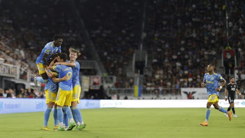 Aug 20, 2022; Washington, District of Columbia, USA; Philadelphia Union forward Mikael Uhre (7) celebrates with teammates after scoring a goal against D.C. United in the first half at Audi Field. Mandatory Credit: Geoff Burke-USA TODAY Sports