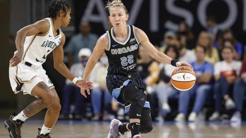 Aug 20, 2022; Chicago, Illinois, USA; Chicago Sky guard Courtney Vandersloot (22) is defended by New York Liberty guard Crystal Dangerfield (3) during the first half of Game 2 of the first round of the WNBA playoffs at Wintrust Arena. Mandatory Credit: Kamil Krzaczynski-USA TODAY Sports