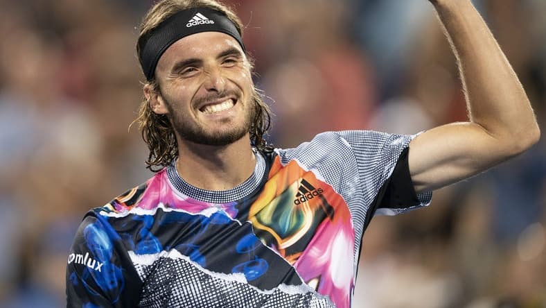 Aug 20, 2022; Cincinnati, OH, USA; Stefanos Tsitsipas (GRE) celebrates after defeating Daniil Medvedev (RUS) at the Western & Southern Open at the Lindner Family Tennis Center. Mandatory Credit: Susan Mullane-USA TODAY Sports