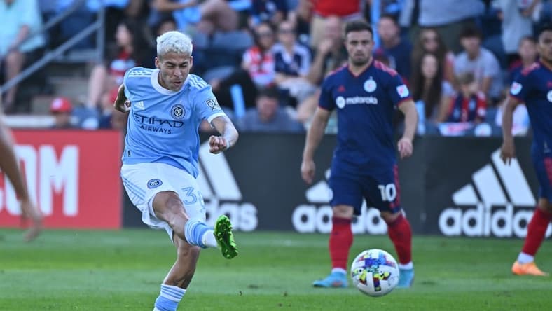 Aug 21, 2022; Chicago, Illinois, USA;  New York City FC midfielder Gabriel Pereira dos Santos (38) shoots for a goal in the first half against the Chicago Fire FC at Bridgeview Stadium. Mandatory Credit: Jamie Sabau-USA TODAY Sports
