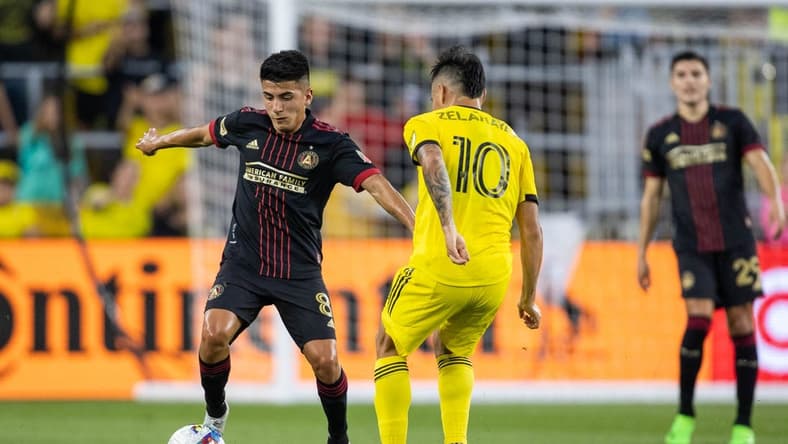 Aug 21, 2022; Columbus, Ohio, USA; Atlanta United midfielder Thiago Almada (8) dribbles the ball while Columbus Crew midfielder Lucas Zelarayan (10) defends in the first half at Lower.com Field. Mandatory Credit: Trevor Ruszkowski-USA TODAY Sports