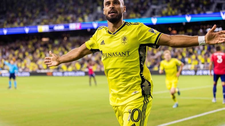 Aug 21, 2022; Nashville, Tennessee, USA;  Nashville SC midfielder Hany Mukhtar (10) celebrates after scoring an early goal in the match against FC Dallas at Geodis Park. Mandatory Credit: Casey Gower-USA TODAY Sports