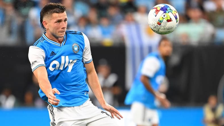 Aug 21, 2022; Charlotte, North Carolina, USA; Charlotte FC midfielder Brandt Bronico (13) with the ball in the first half at Bank of America Stadium. Mandatory Credit: Bob Donnan-USA TODAY Sports