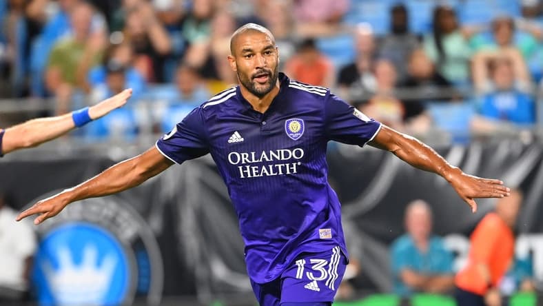 Aug 21, 2022; Charlotte, North Carolina, USA; Orlando City forward Tesho Akindele (13) reacts after scoring the winning goal in the second half at Bank of America Stadium. Mandatory Credit: Bob Donnan-USA TODAY Sports