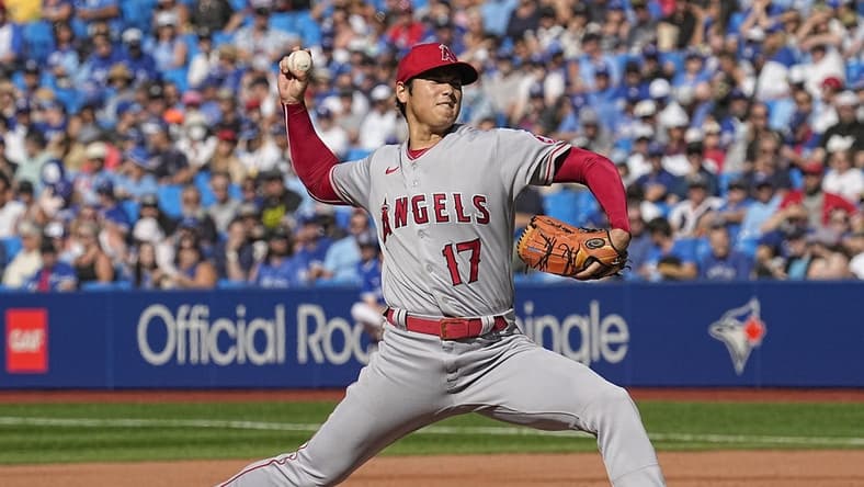 Aug 27, 2022; Toronto, Ontario, CAN; Los Angeles Angels starting pitcher Shohei Ohtani (17) pitches to the Toronto Blue Jays during the second inning at Rogers Centre. Mandatory Credit: John E. Sokolowski-USA TODAY Sports