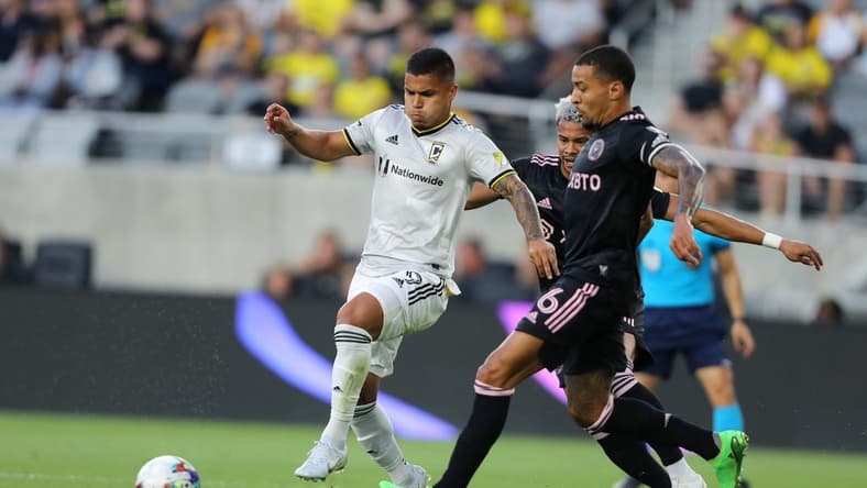 Aug 31, 2022; Columbus, Ohio, USA;  Columbus Crew forward Cucho Hernandez (9) fights for the ball with Inter Miami midfielder Mo Adams (6) during the first half at Lower.com Field. Mandatory Credit: Joseph Maiorana-USA TODAY Sports