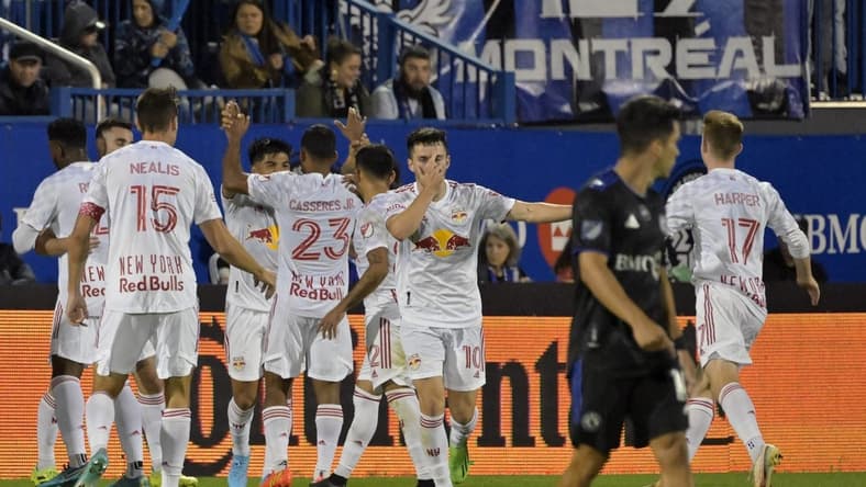 Aug 31, 2022; Montreal, Quebec, CAN; New York Red Bulls midfielder Lewis Morgan (10) celebrates after scoring a goal against the CF Montreal during the first half at Stade Saputo. Mandatory Credit: Eric Bolte-USA TODAY Sports