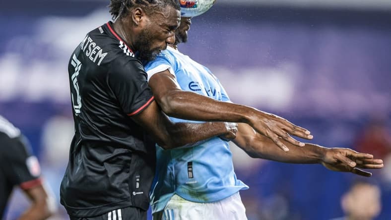 Aug 31, 2022; Harrison, New Jersey, USA; D.C. United defender Chris Odoi-Atsem (3) battles for a high ball against New York City FC forward Talles Magno (43) during the first half at Red Bull Arena. Mandatory Credit: Vincent Carchietta-USA TODAY Sports