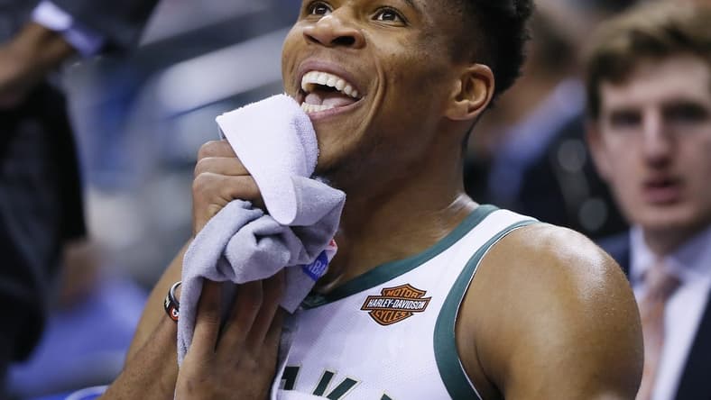 Jan 31, 2019; Toronto, Ontario, CAN; Milwaukee Bucks forward Giannis Antetokounmpo (34) smiles on the bench during a break against the Toronto Raptors at Scotiabank Arena. Milwaukee Bucks defeated Toronto. Mandatory Credit: John E. Sokolowski-USA TODAY Sports
