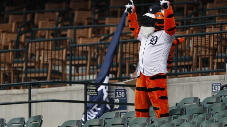 Sep 9, 2020; Detroit, Michigan, USA; Detroit Tigers mascot Paws cheers from the bleachers during the first inning against the Milwaukee Brewers at Comerica Park. Mandatory Credit: Raj Mehta-USA TODAY Sports