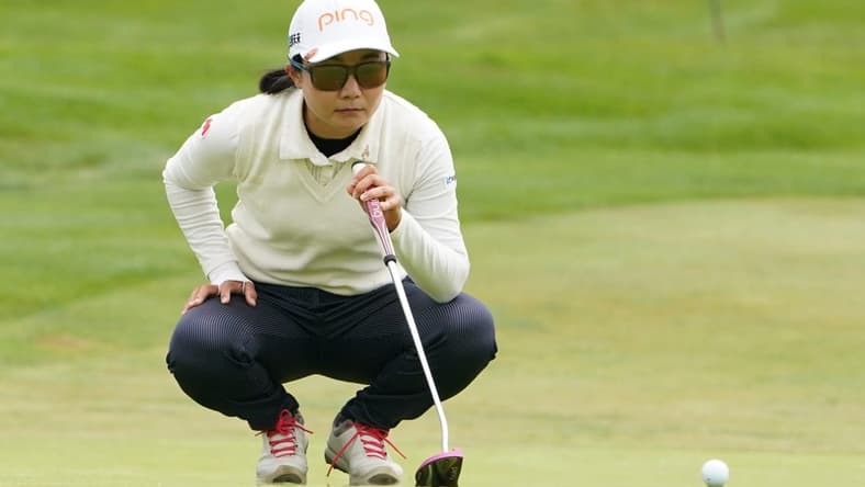 June 13, 2021; Daly City, California, USA; Ayako Uehara lines up her putt on the second hole during the final round of the LPGA MEDIHEAL Championship golf tournament at Lake Merced Golf Club. Mandatory Credit: Kyle Terada-USA TODAY Sports