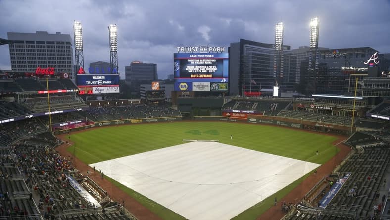Jul 19, 2021; Atlanta, Georgia, USA; General view of the tarp on the field at Truist Park after a game was canceled between the Atlanta Braves and San Diego Padres due to rain. Mandatory Credit: Brett Davis-USA TODAY Sports