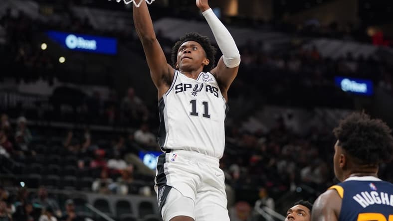 Oct 4, 2021; San Antonio, Texas, USA; San Antonio Spurs guard Josh Primo (11) shoots in the second half against the Utah Jazz at the AT&T Center. Mandatory Credit: Daniel Dunn-USA TODAY Sports