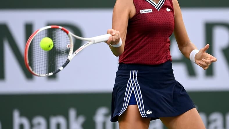 Oct 14, 2021; Indian Wells, CA, USA; Anett Kontaveit (EST) hits a shot against Ons Jabeur (TUN) in their quarterfinal match during the BNP Paribas Open at the Indian Wells Tennis Garden. Mandatory Credit: Jayne Kamin-Oncea-USA TODAY Sports