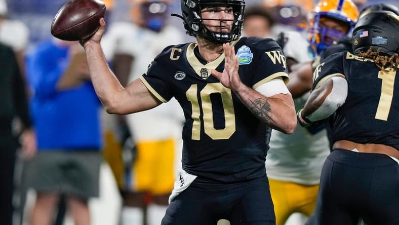 Dec 4, 2021; Charlotte, NC, USA; Wake Forest Demon Deacons quarterback Sam Hartman (10) during the first quarter in the ACC championship game at Bank of America Stadium. Mandatory Credit: Jim Dedmon-USA TODAY Sports