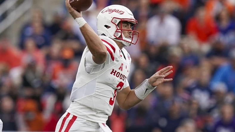 Dec 28, 2021; Birmingham, Alabama, USA; Houston Cougars quarterback Clayton Tune (3) passes against the Auburn Tigers during the second half of the 2021 Birmingham Bowl at Protective Stadium. Mandatory Credit: Marvin Gentry-USA TODAY Sports