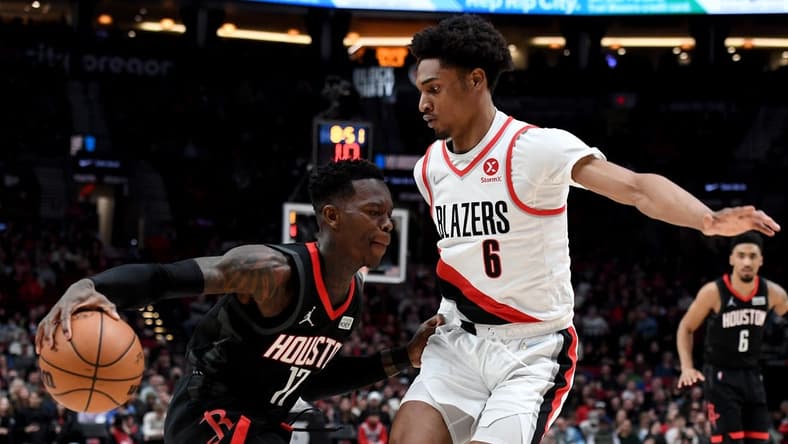 Mar 25, 2022; Portland, Oregon, USA; Houston Rockets guard Dennis Schroder (17) tries to get past Portland Trail Blazers guard Keon Johnson (6) during the second half of the game at Moda Center. The Rockets won 125-106. Mandatory Credit: Steve Dykes-USA TODAY Sports