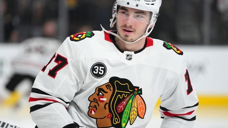 Mar 26, 2022; Las Vegas, Nevada, USA; Chicago Blackhawks center Kirby Dach (77) warms up before a game against the Vegas Golden Knights at T-Mobile Arena. Mandatory Credit: Stephen R. Sylvanie-USA TODAY Sports