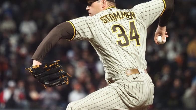 Apr 11, 2022; San Francisco, California, USA; San Diego Padres relief pitcher Craig Stammen (34) pitches the ball against the San Francisco Giants during the seventh inning at Oracle Park. Mandatory Credit: Kelley L Cox-USA TODAY Sports