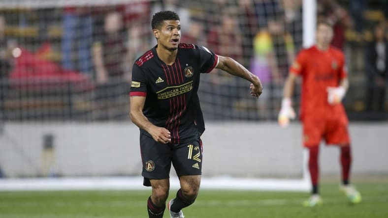 Apr 20, 2022; Kennesaw, Georgia, USA; Atlanta United defender Miles Robinson (12) dribbles against Chattanooga FC in the second half at Fifth Third Bank Stadium. Mandatory Credit: Brett Davis-USA TODAY Sports